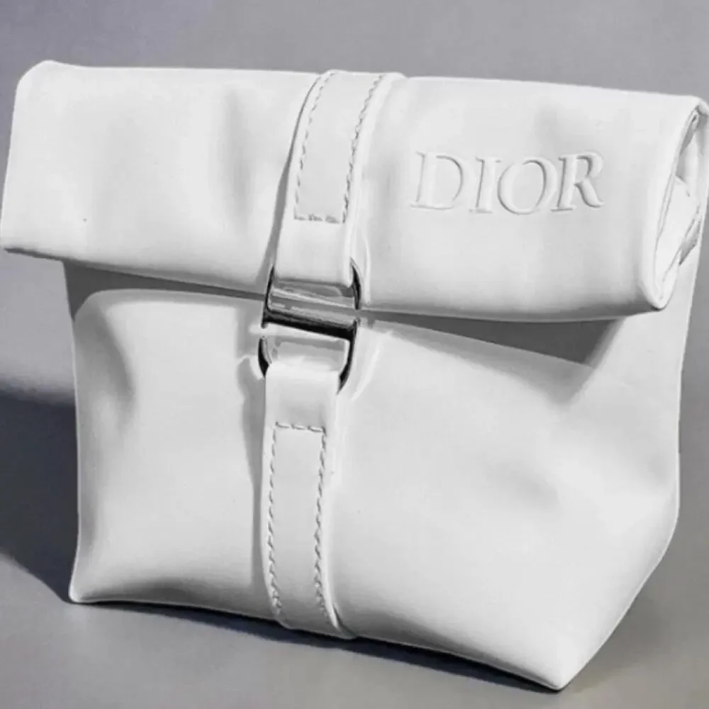 Dior white roll top cosmetic pouch